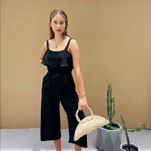Black jumpsuit with Side pockets and tie front